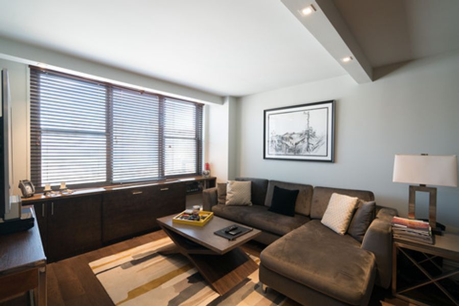 A living room with a couch and a coffee table