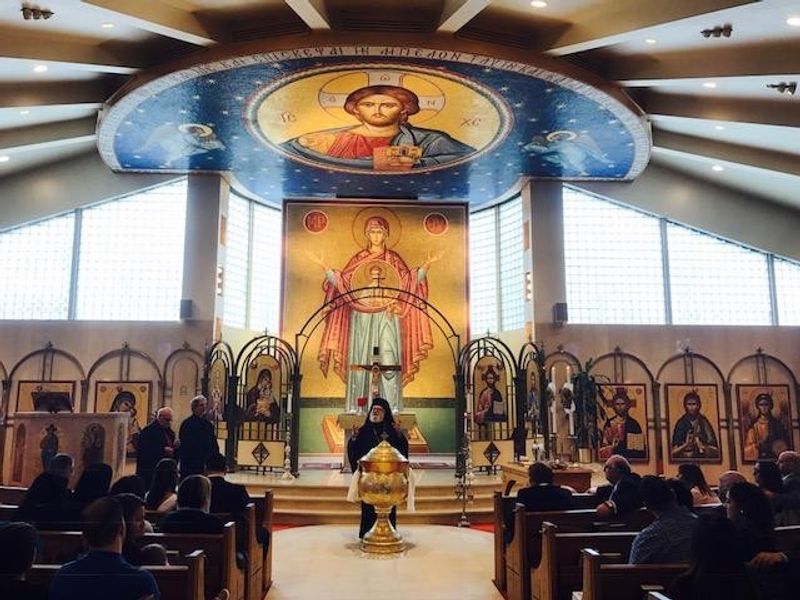 A church with a painting of jesus on the ceiling