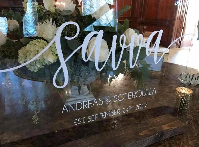 A glass table with the name andreas and soterrulla on it