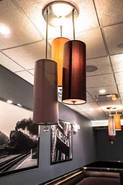 A restaurant with a picture on the wall that says chelsea