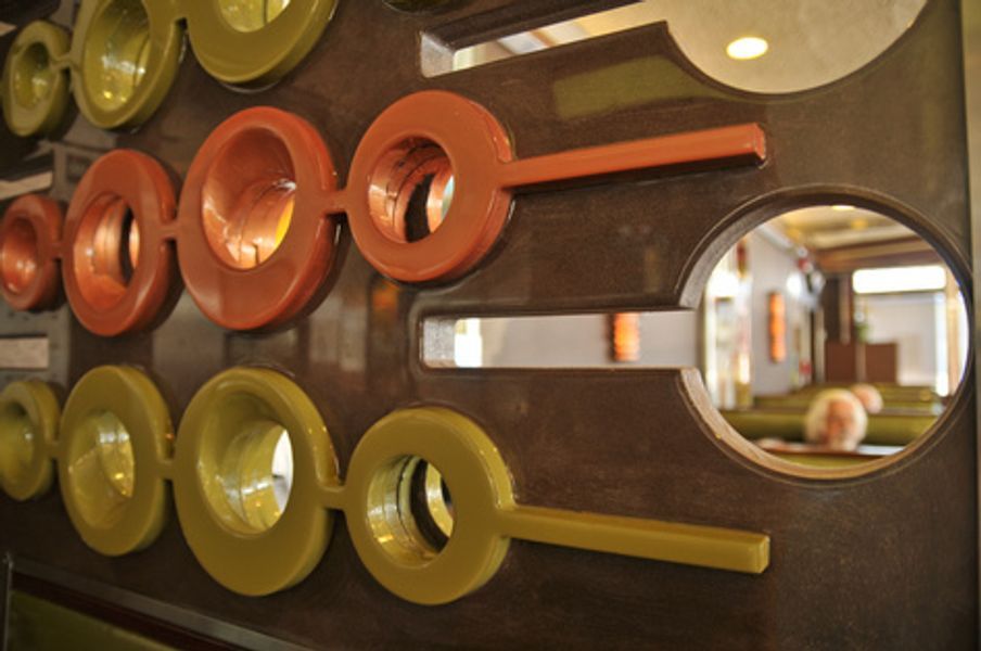 A wall with a lot of circles on it