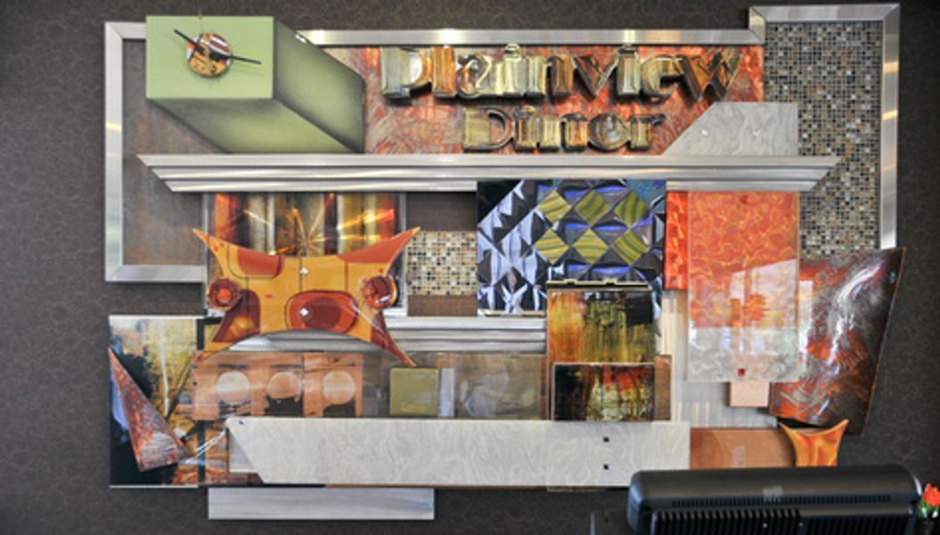 A painting on a wall with the word rhythm on it