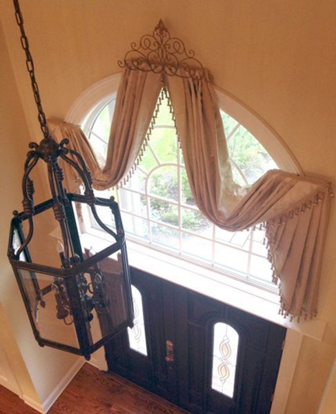 A lantern is hanging from the ceiling above a door