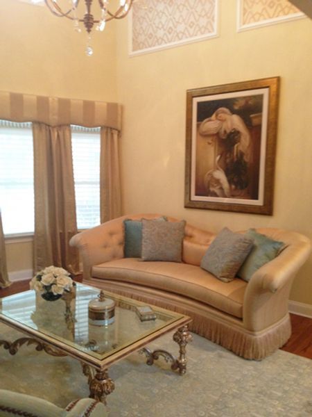 A living room with a couch and a coffee table