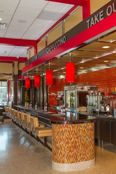 A restaurant with a sign that says take out