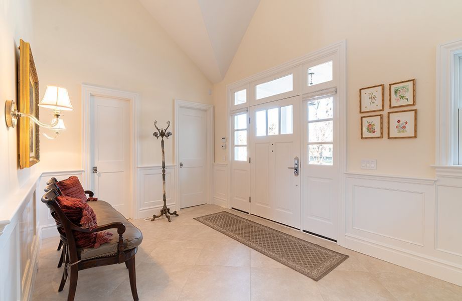 There is a bench in the middle of the hallway