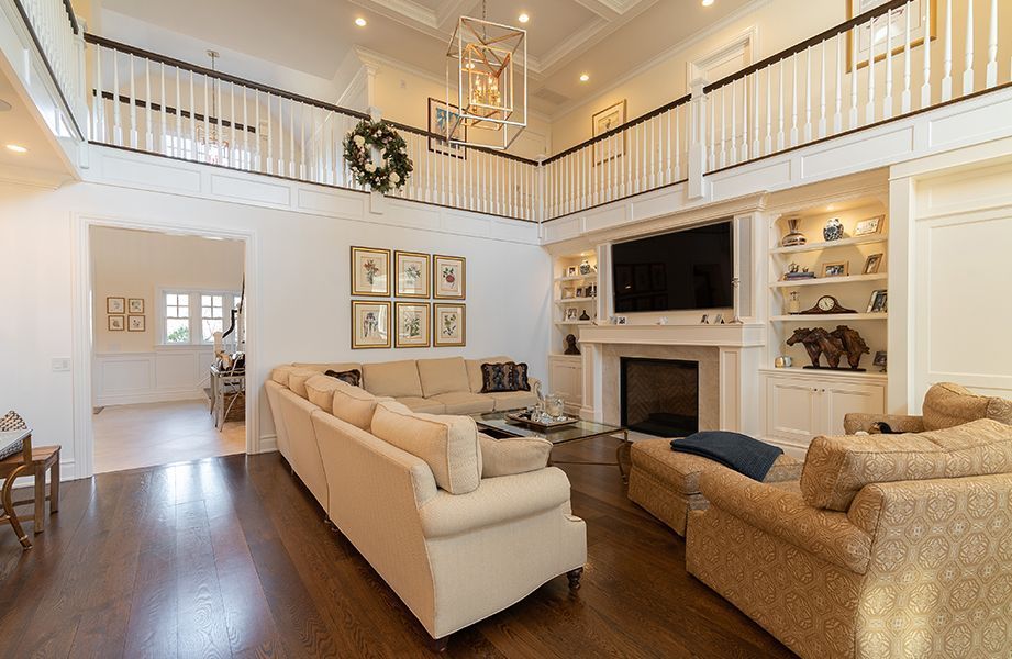 A living room filled with furniture and a fireplace