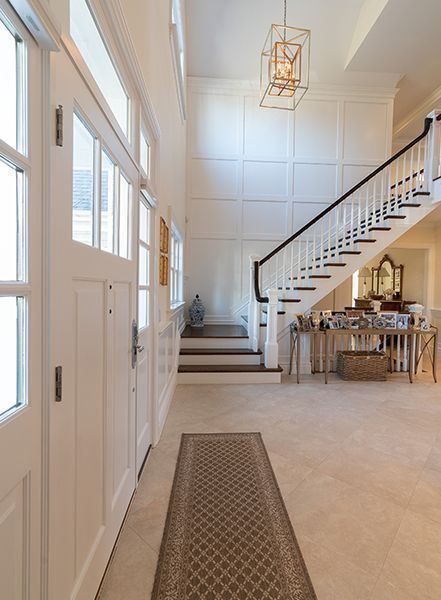 There is a staircase in the middle of the hallway