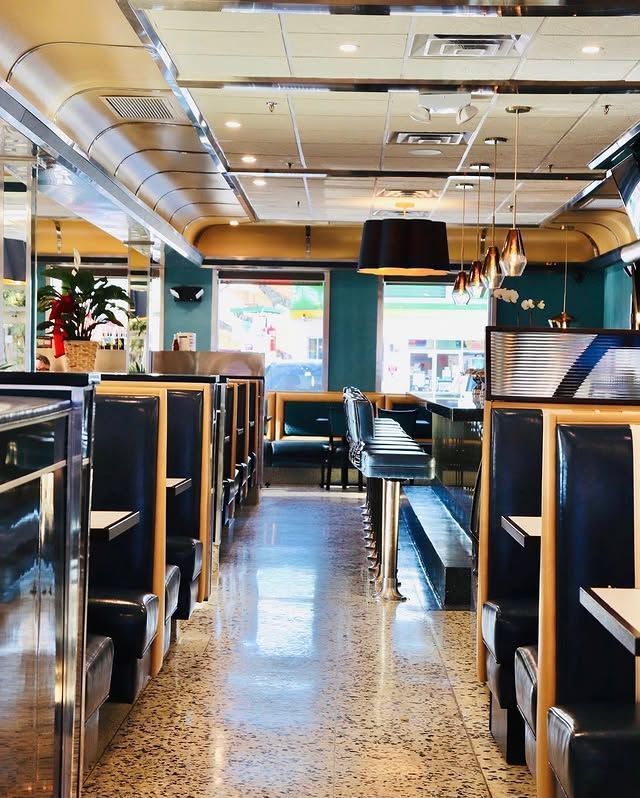 A diner with a lot of booths and tables