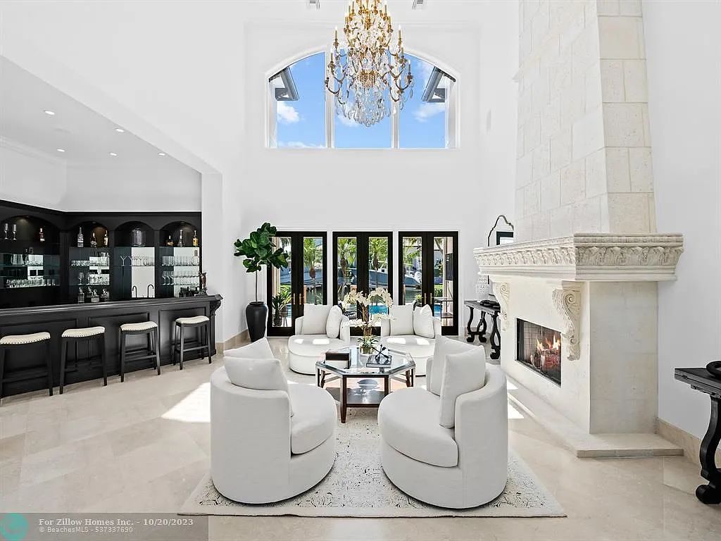 A living room filled with furniture and a fireplace.