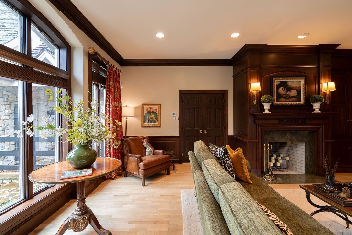 A living room with a fireplace and a couch