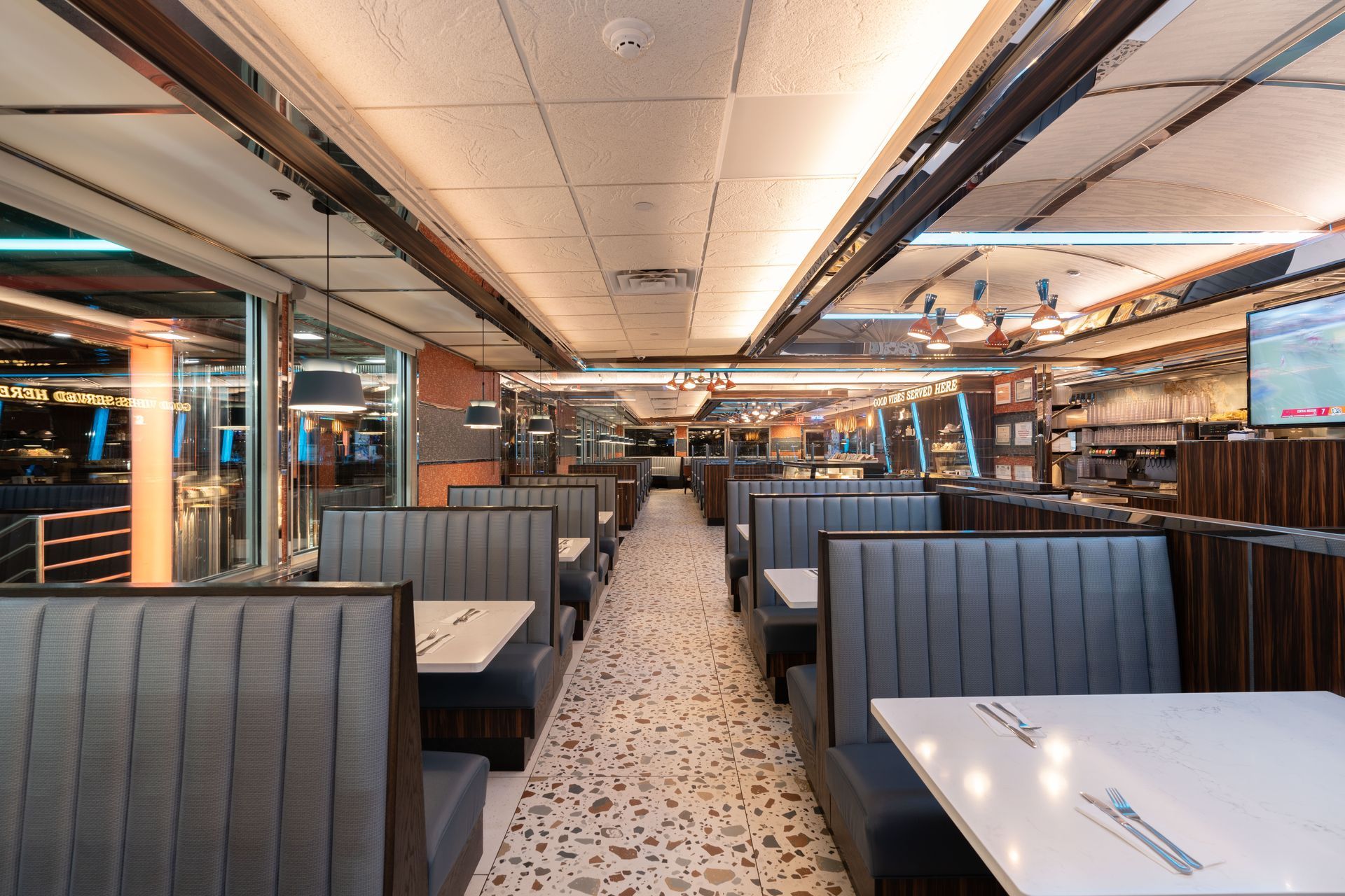 A diner with a lot of booths and tables