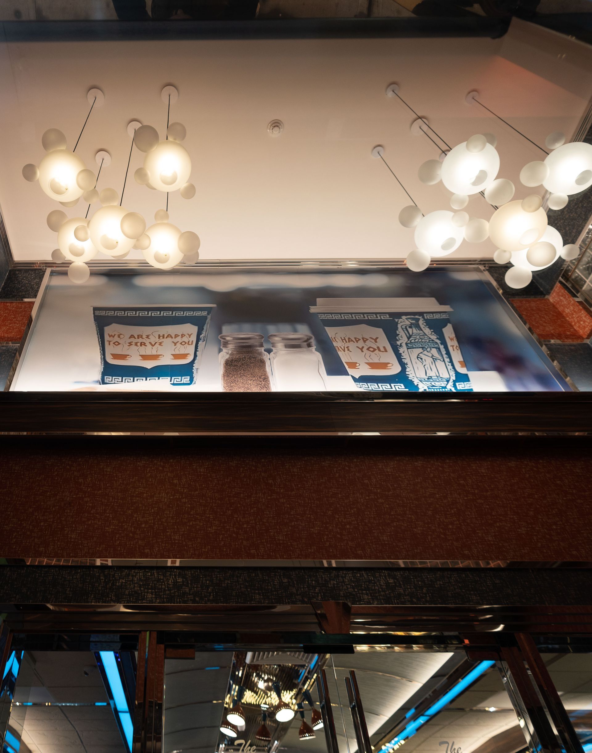 A ceiling with a sign that says ' a ' on it