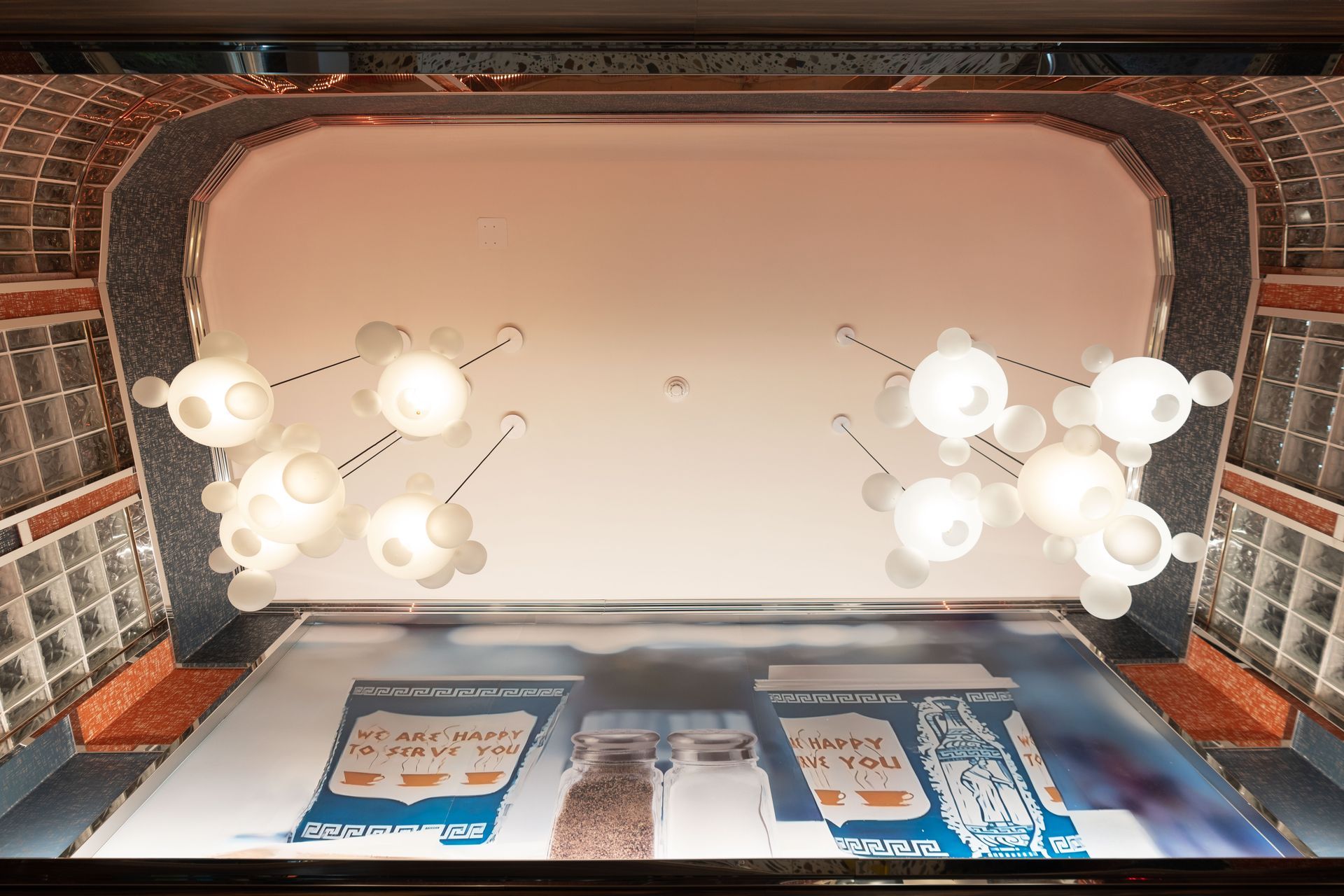 A room with a lot of lights on the ceiling