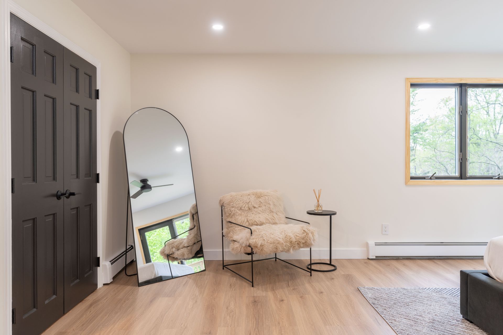 There is a large mirror in the middle of the room.