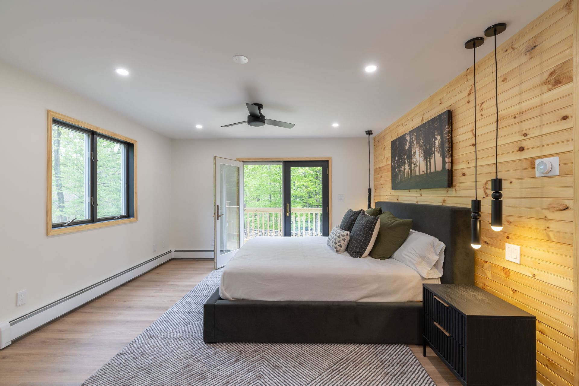 There is a large bed in the middle of the room.