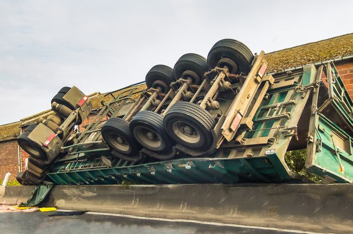 Crashed truck in the road.