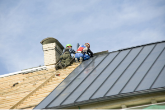 Roofers working on residential home in Cheyenne WY