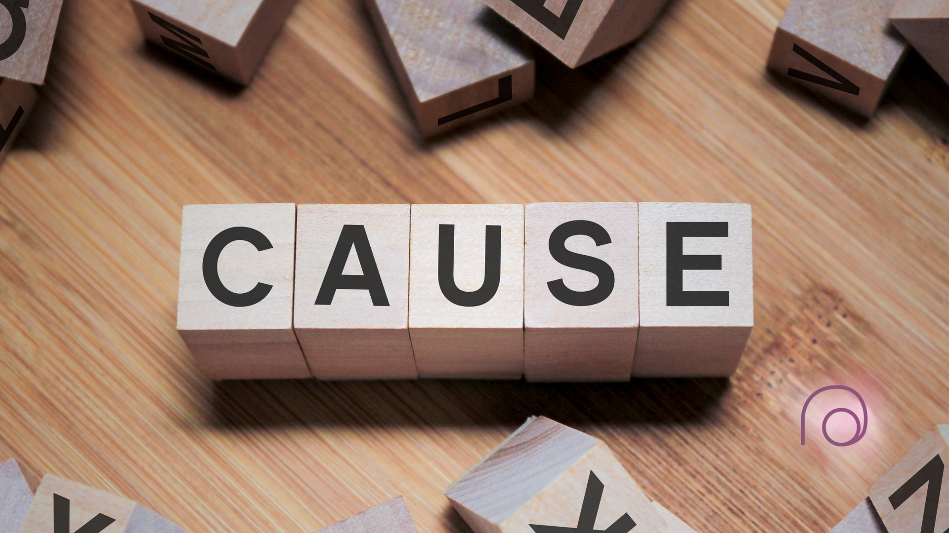 The word cause is written on wooden blocks on a wooden table.