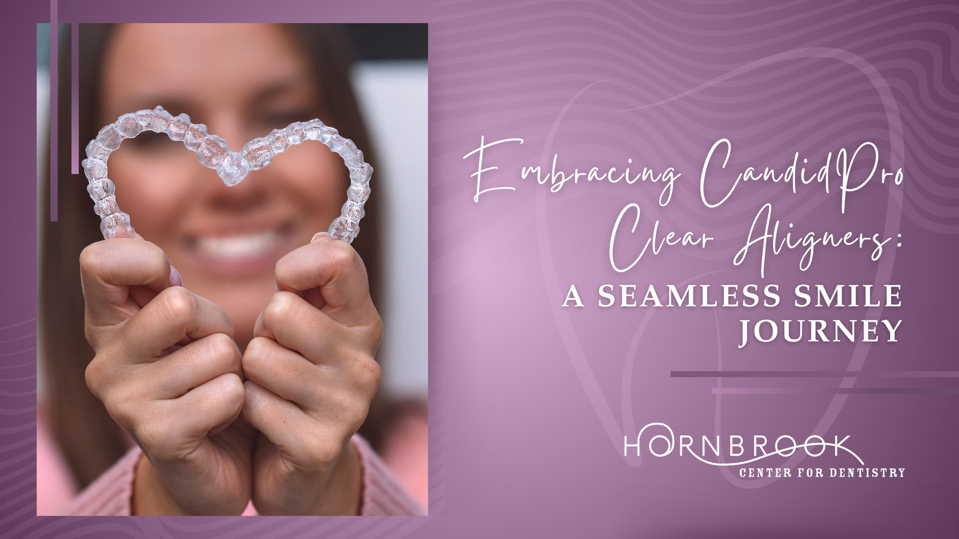 A woman is holding a clear aligner in the shape of a heart.