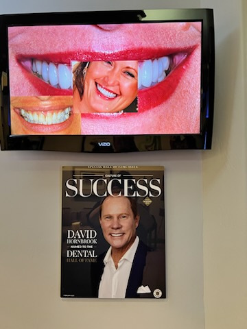 A picture of a woman 's smile next to a magazine titled success