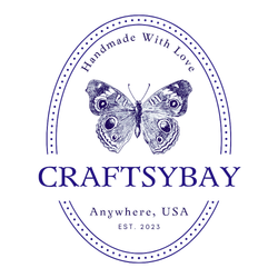 A craftsy bay logo with a butterfly on it