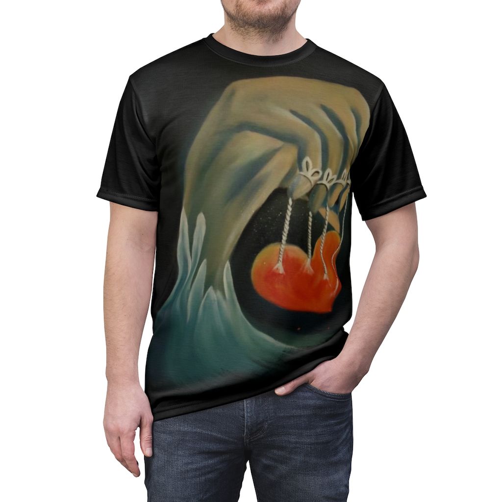 A man wearing a black t-shirt with a picture of a hand holding a swing