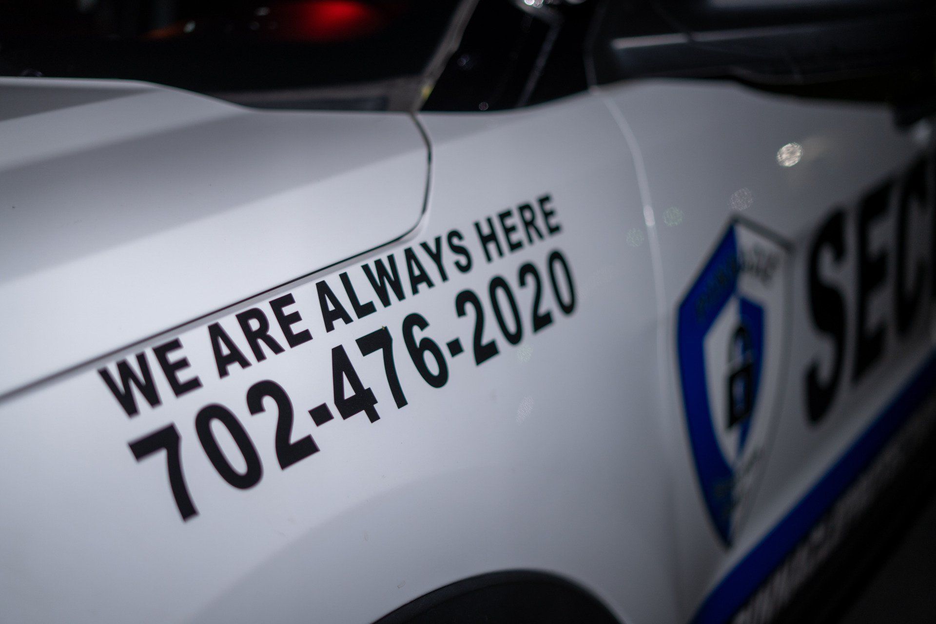 the side of a police car says we are always here