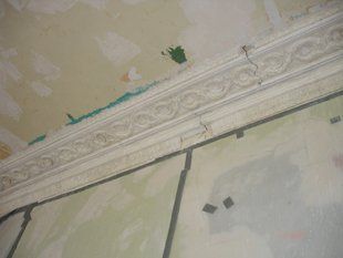 Broken plaster cornice which needs plastering repairs