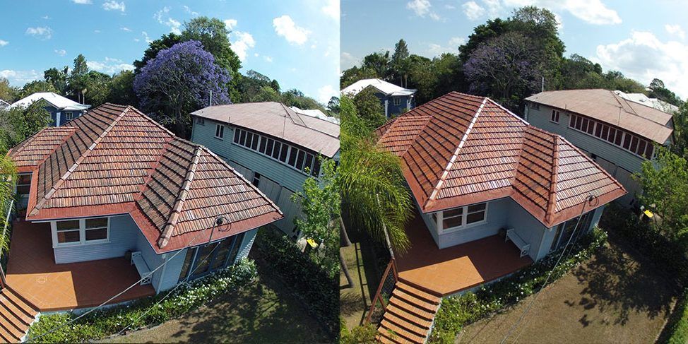 An aerial view of a house with a red tiled roof