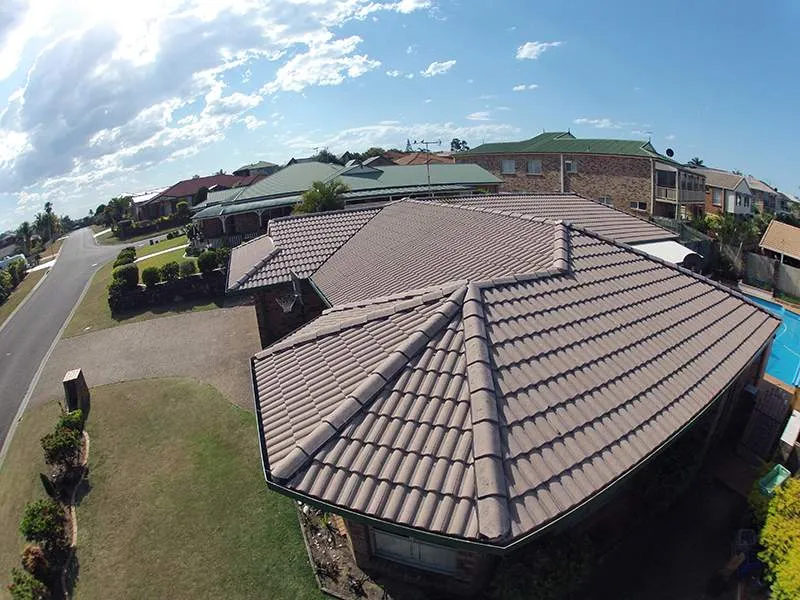 An aerial view of a house with a tiled roof
