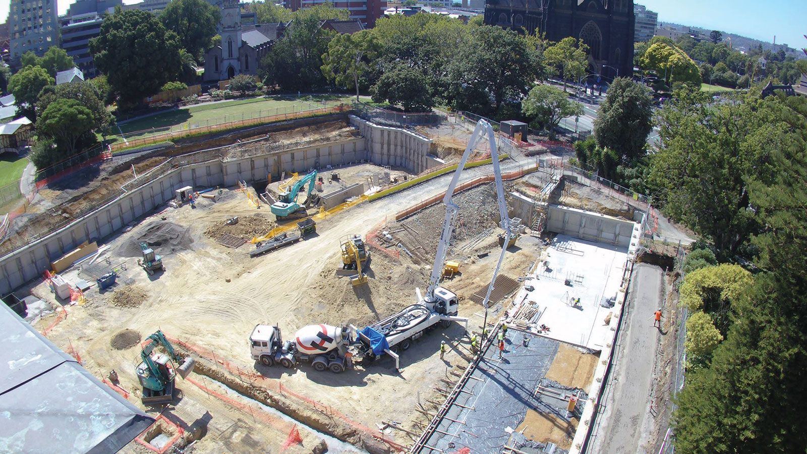 An aerial view of a construction site with a lot of machinery.