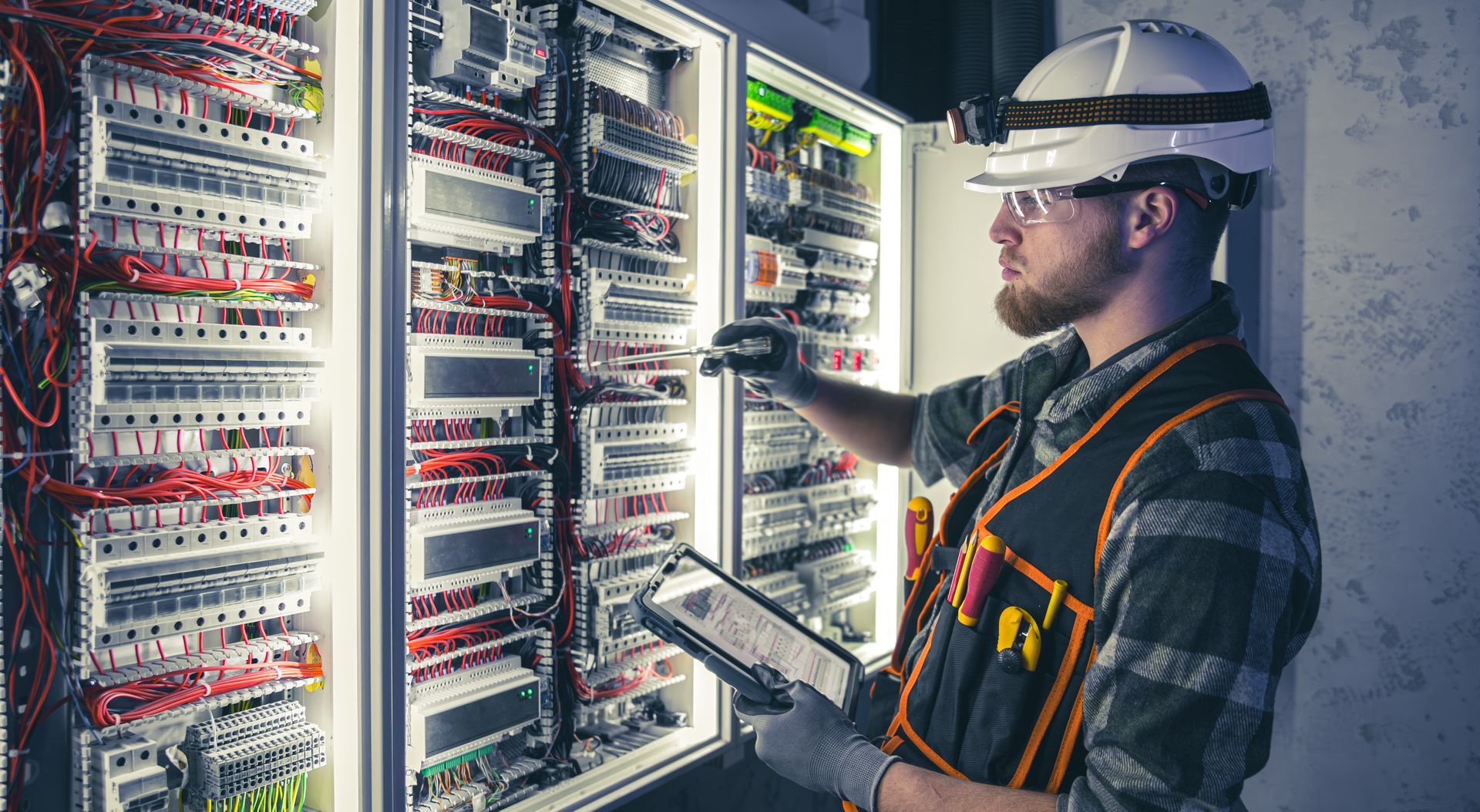 Electricians working on projects with 