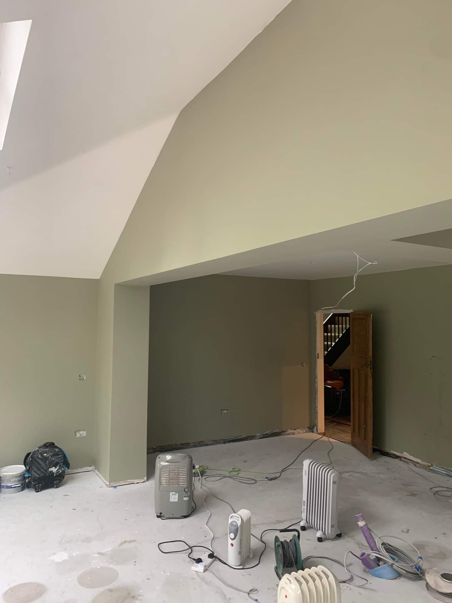 Picture of a kitchen painted in sage green by painters and decorators Leeds