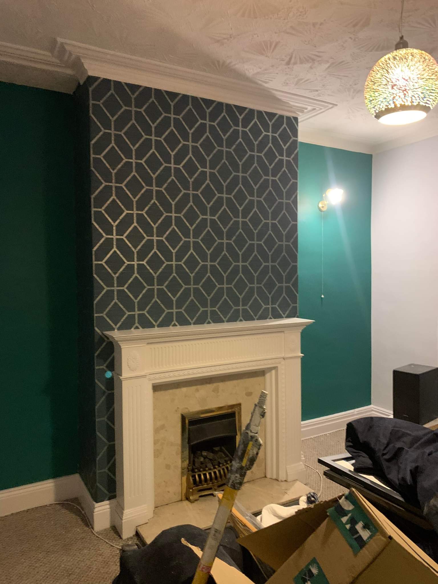 Picture of designer wallpaper hanging by painters and decorators Leeds
