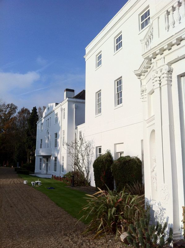 Picture of a house in Leeds with the exterior painted brilliant white, completed by Painters and Decorators in Leeds