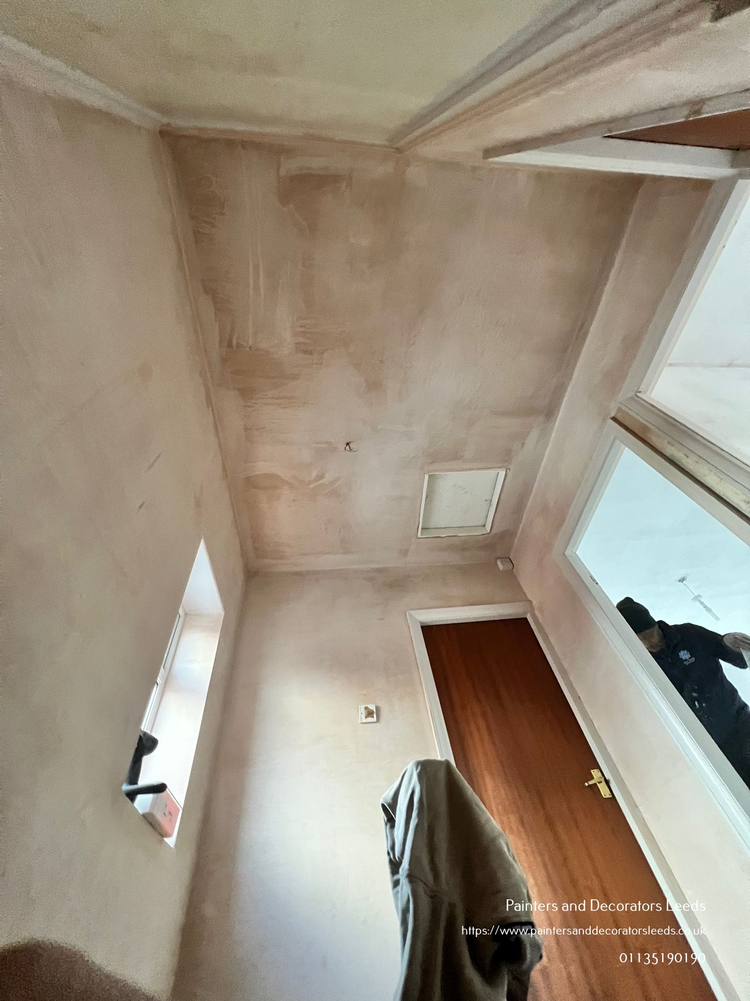 picture of a newly plastered landing by painters and decorators Leeds