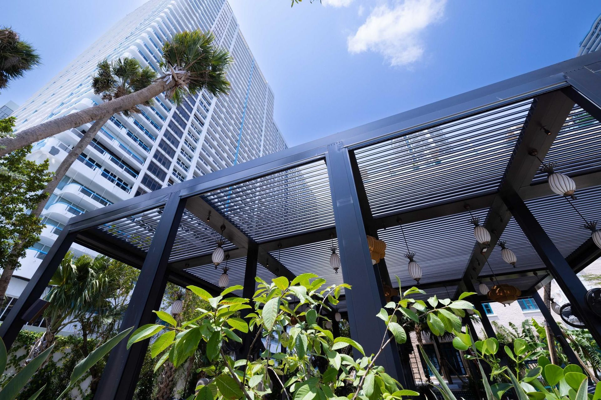Contemporary pergola structure installed in an urban outdoor living space