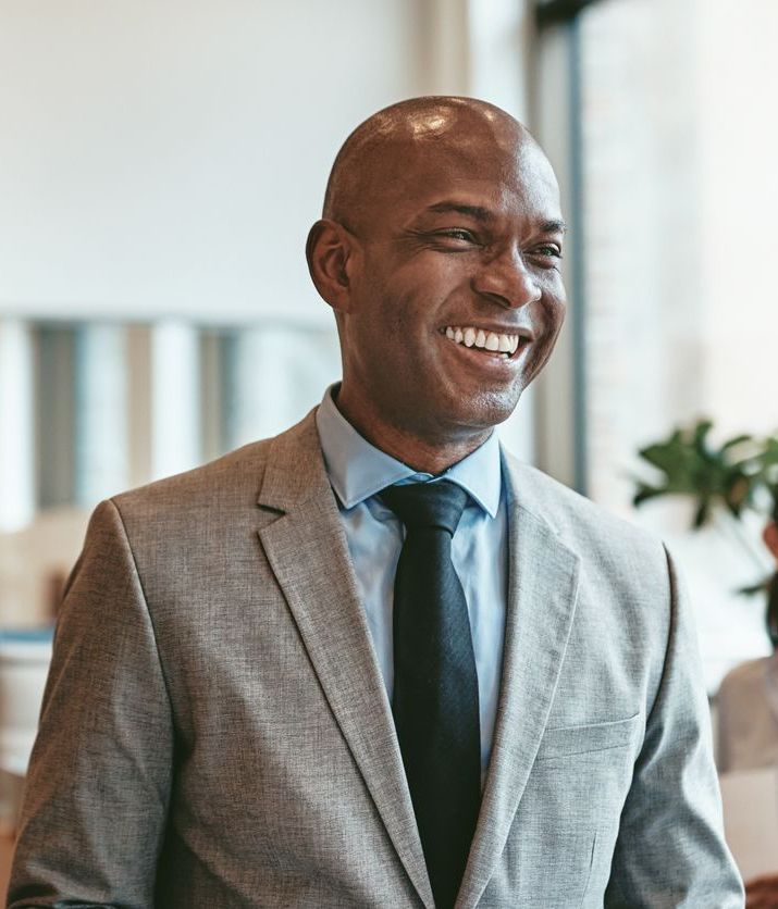 Smiling professional in a modern office setting