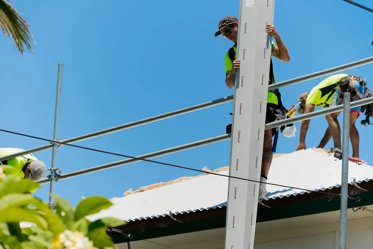 Two worker installing new roof | Brisbane, QLD | Skyes Roofing