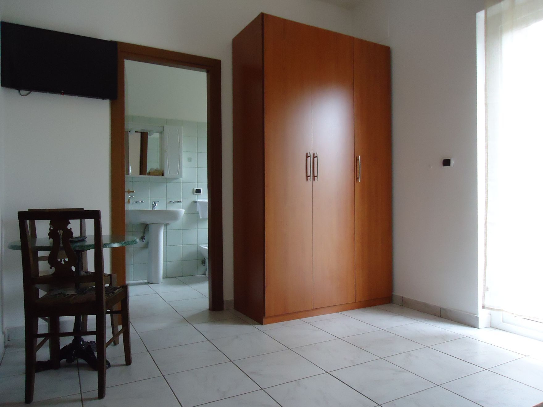 Camera con guardaroba e bagno privato