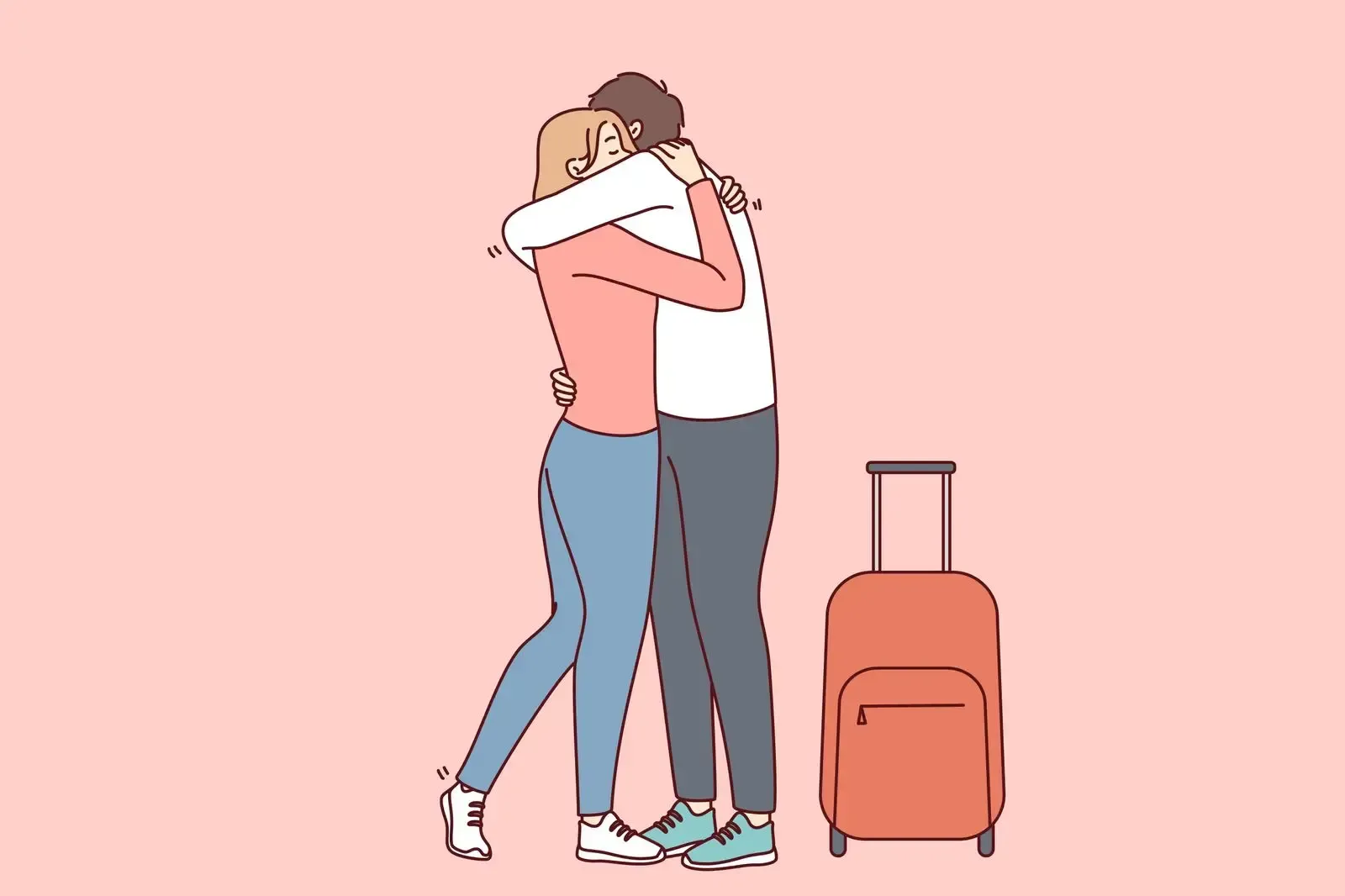 A man and a woman are hugging each other in front of a suitcase.