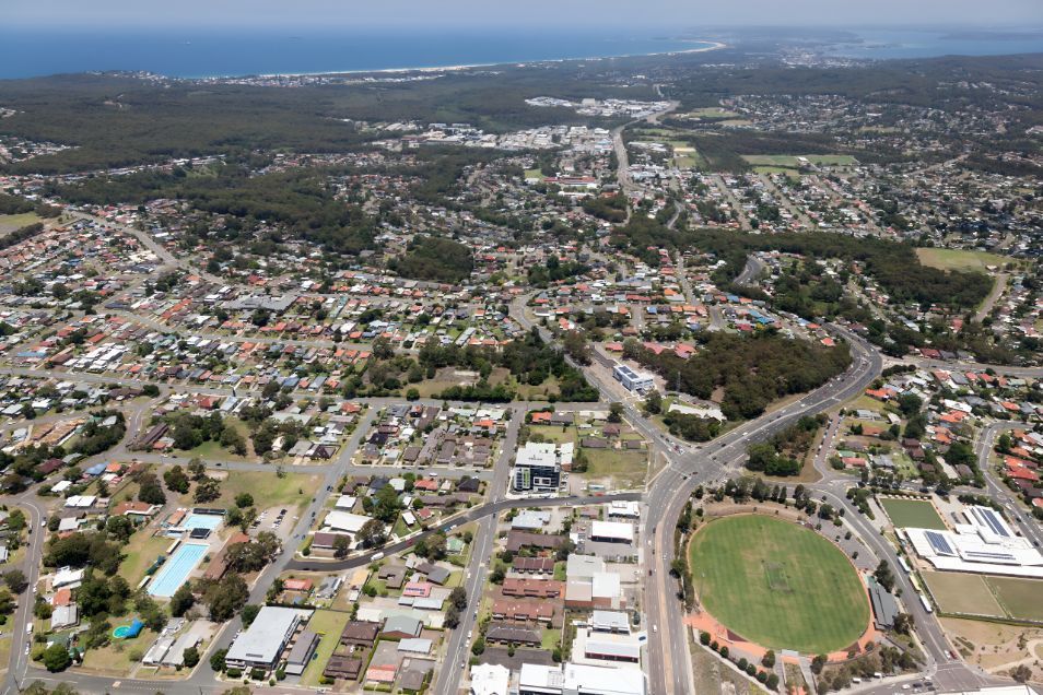 An Aerial View Of A City With A Soccer Field In The Middle 	— Master Glass & Glazing In Charlestown, NSW