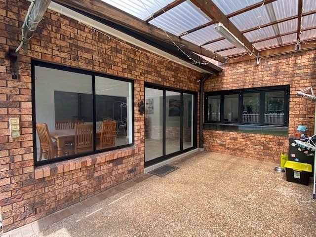 Black Tinted Glass Doors & Windows  — Master Glass & Glazing In Eleebana, NSW