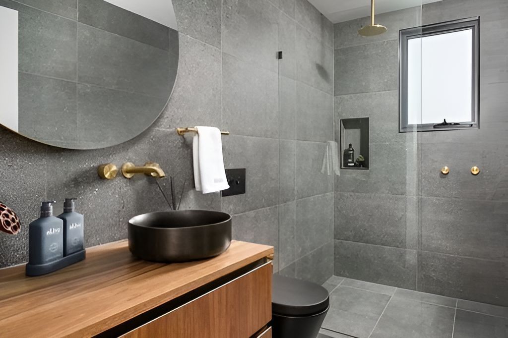 A Bathroom With A Sink, Toilet, Mirror And Walk In Shower — Master Glass & Glazing In Wallsend, NSW