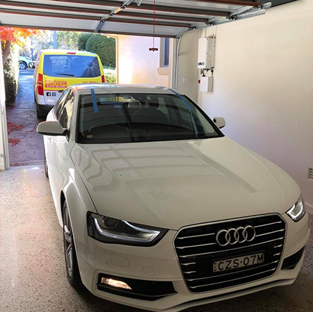 a white car with a new windscreen