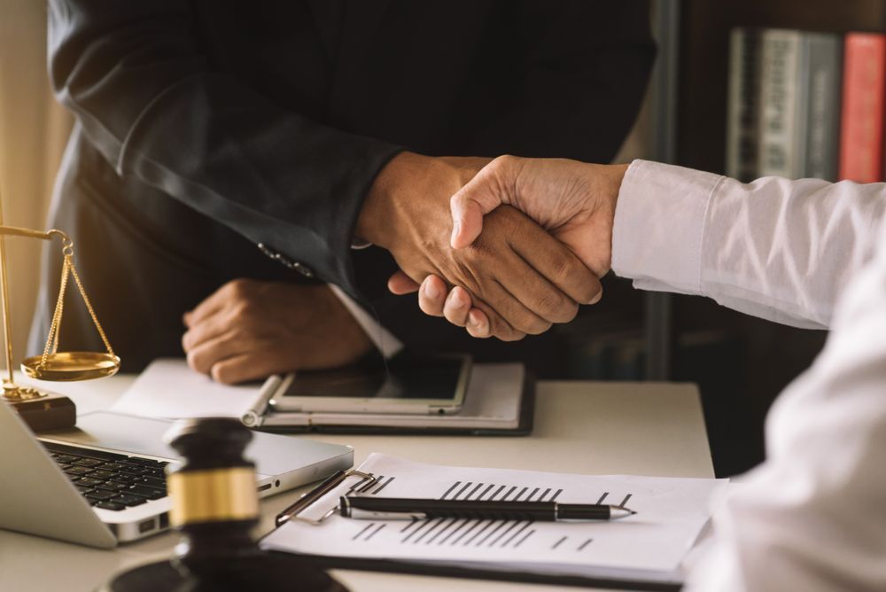 Lawyer and Businessman Shaking Hands