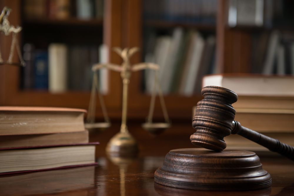 Wooden Gavel and Law Books