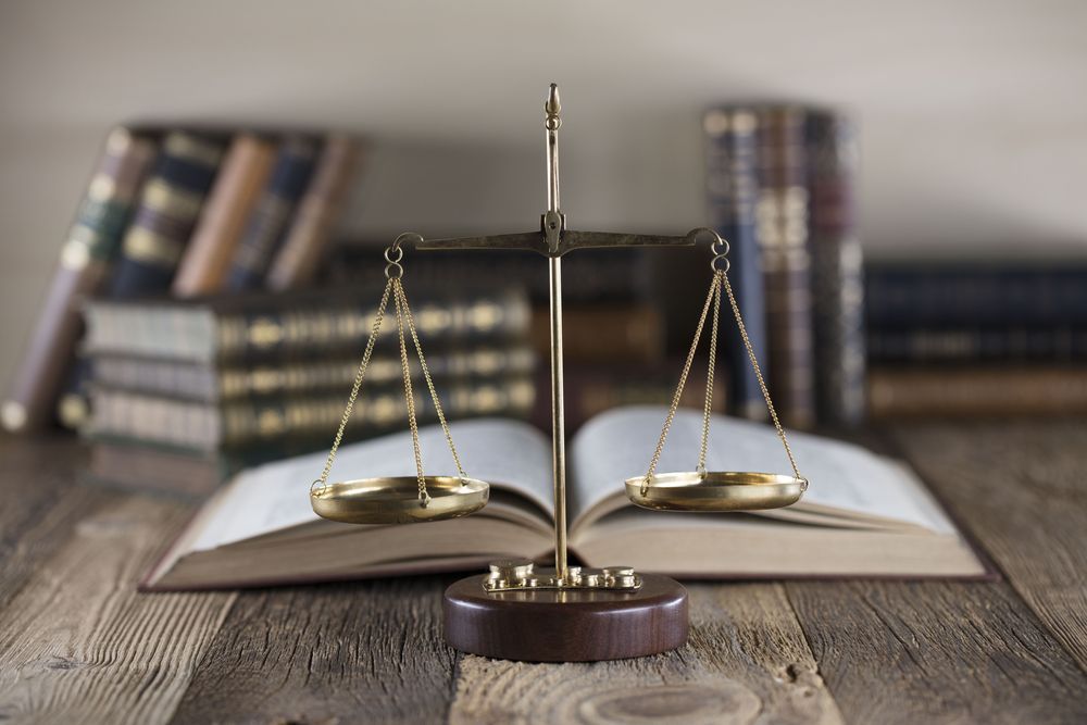 Scales of Justice With Law Books