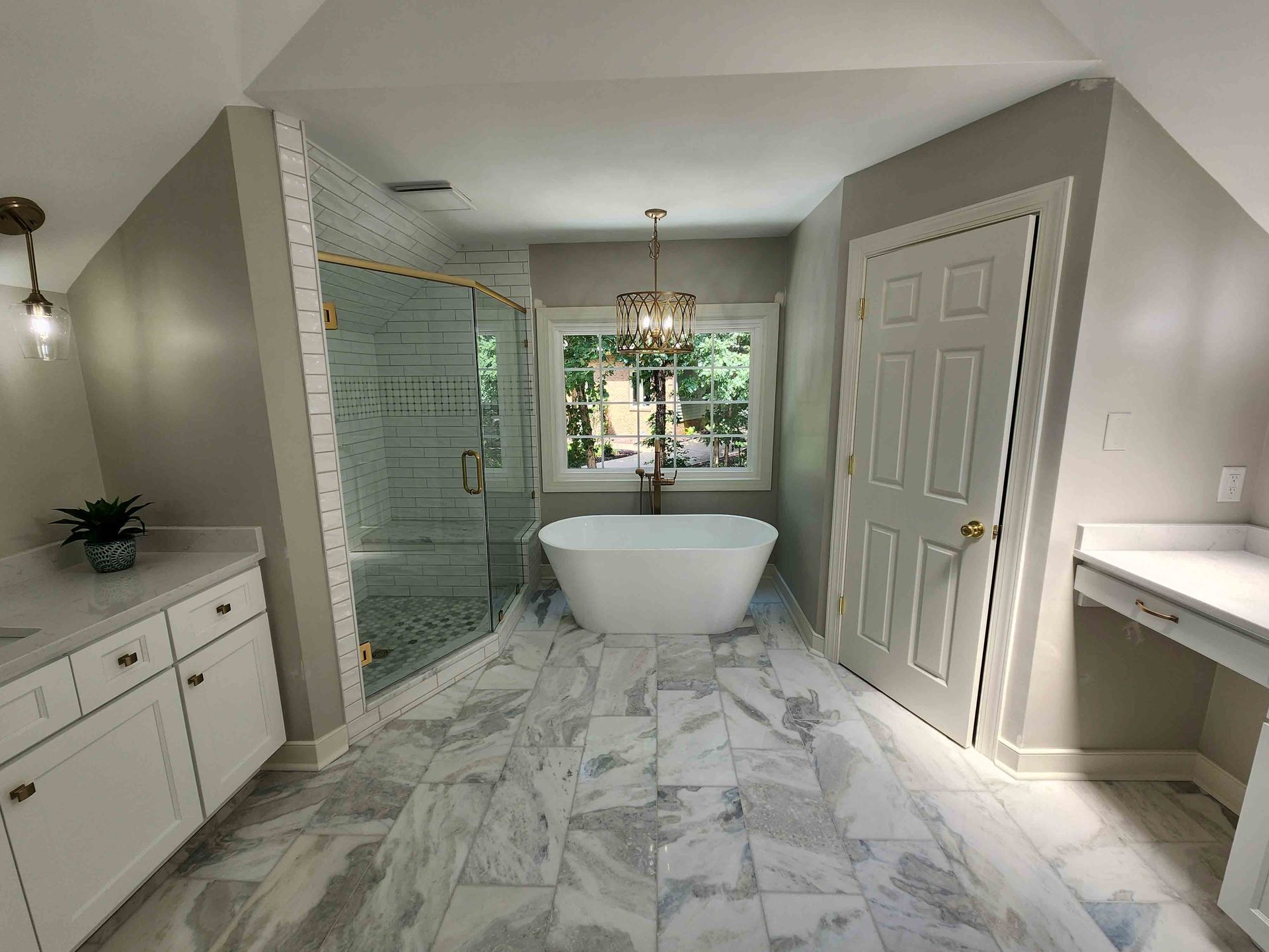 There is a bathtub in the middle of the bathroom.